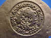 Reverse side detail of Raggedy Ann 90th anniversary pewter casting 